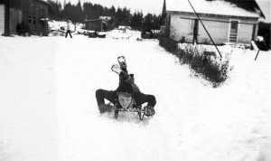 1943-01 Robert (Bob) on sled on driveway